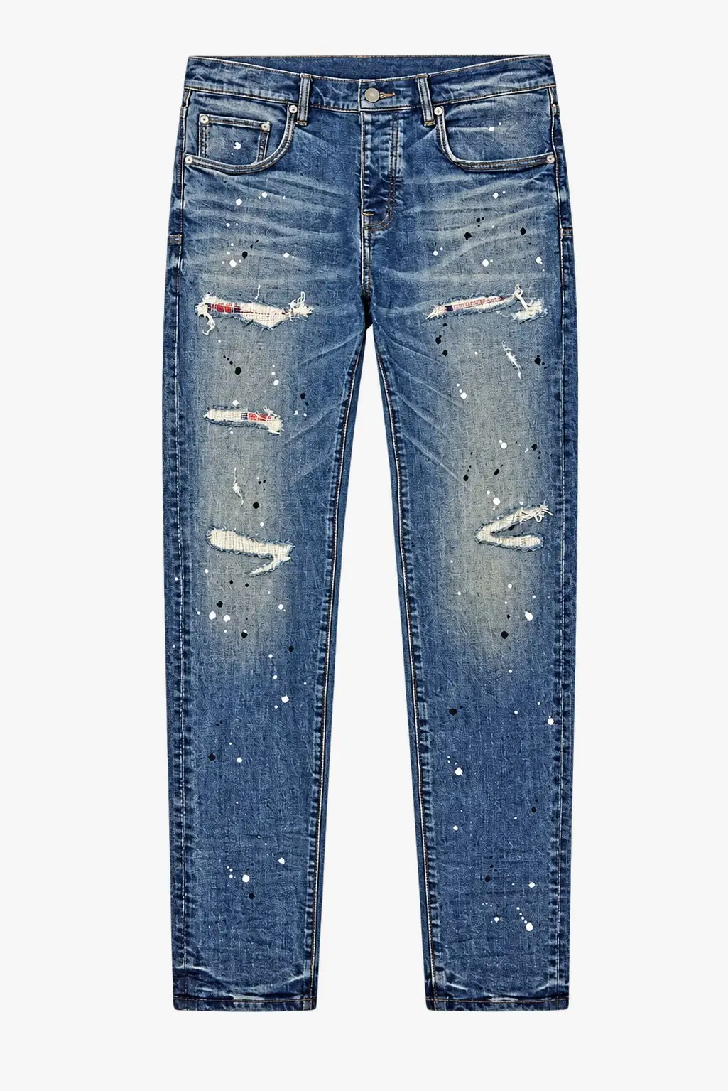 Distressed blue jeans with paint splatter