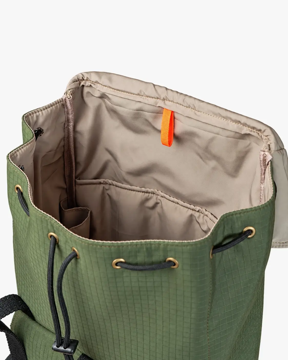 Inside of an olive drawcord backpack