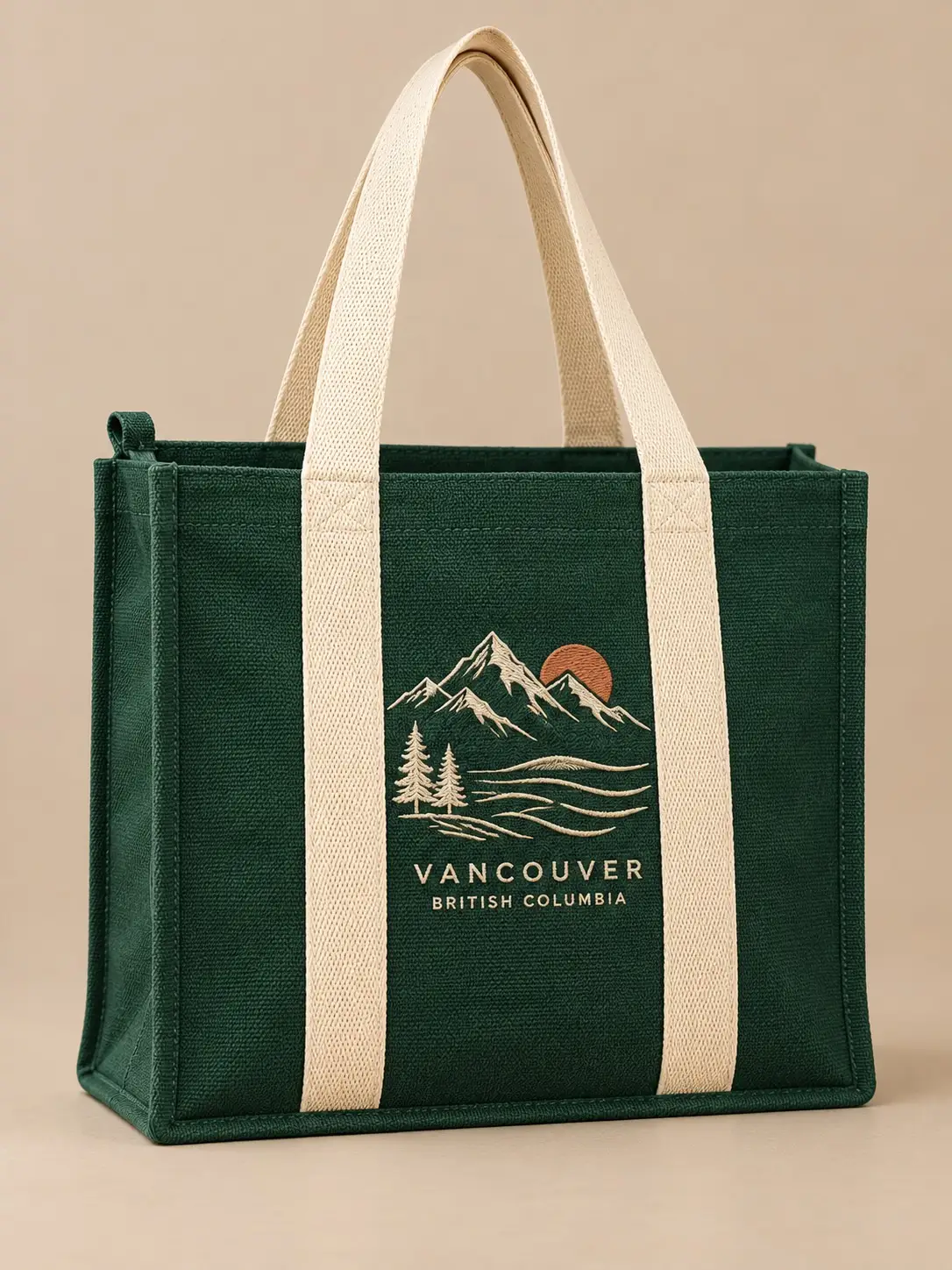 Green canvas tote bag printed with a Vancouver design