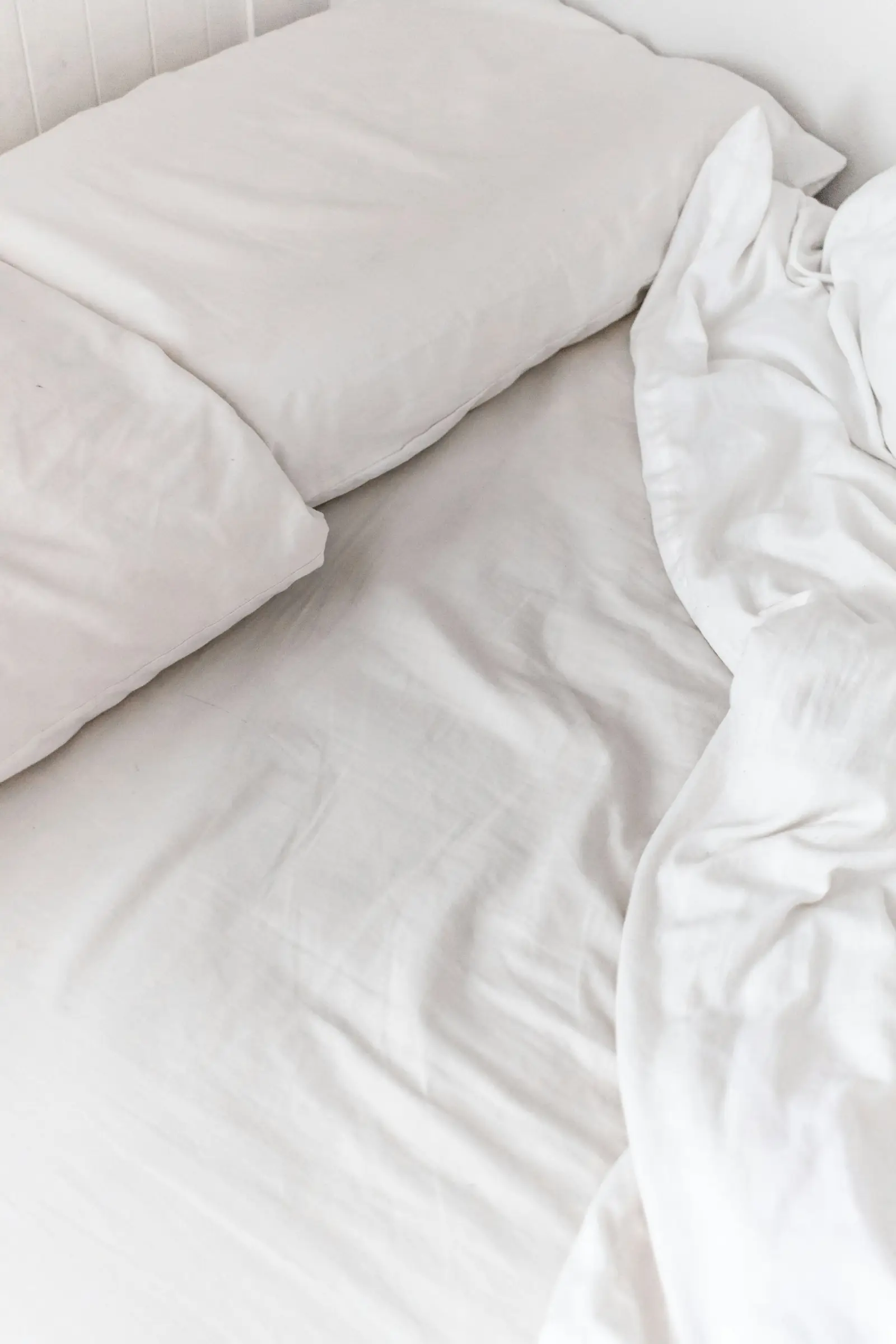 Plain white bed sheets