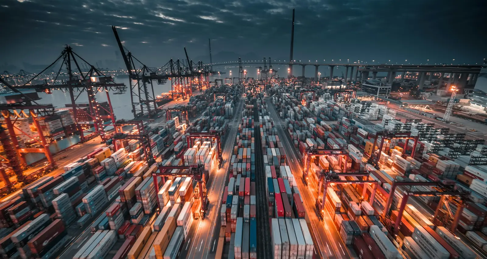 Container port at dusk, ready to ship to Canada